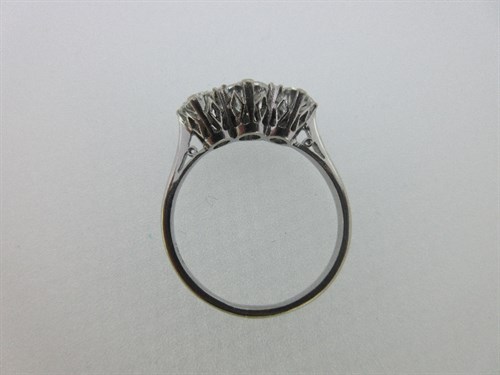 Lot 454 - A three stone diamond ring