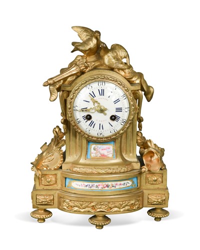 Lot 691 - A French ormolu and porcelain panel mantel clock, 19th century
