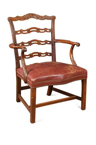 Lot 487 - An early George III mahogany open armchair