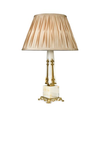 Lot 595 - A white onyx obelisk table lamp
