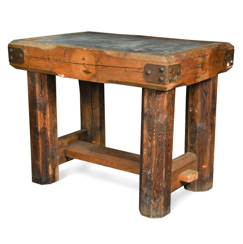 Lot 413 - A butcher's block with inset slate top, 20th century
