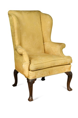 Lot 455 - An Irish George II wingback armchair