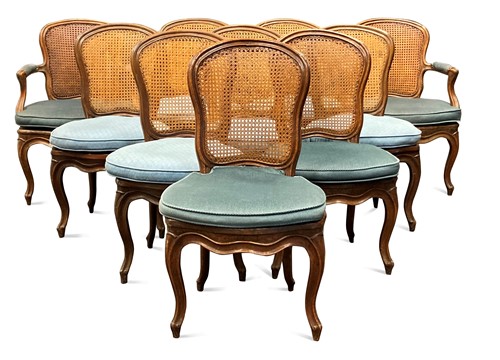 Lot 692 - A set of ten Louis XV style walnut dining chairs