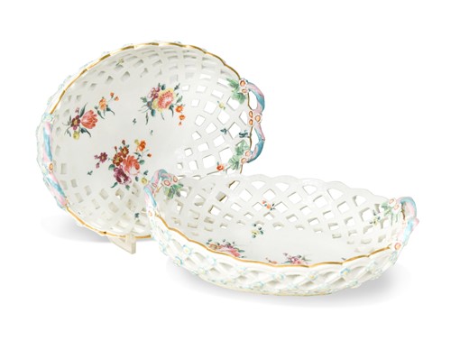 Lot 484 - A composed pair of Chelsea-Derby pierced two-handled oval baskets, circa 1770