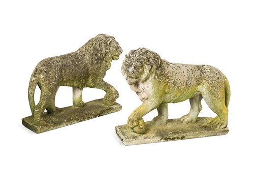 Lot 679 - An opposing pair of composite stone Medici lions, 20th century