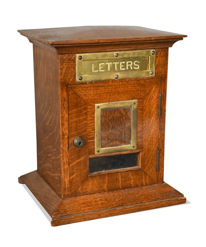 Lot 659 - An oak county house letterbox, early 20th century