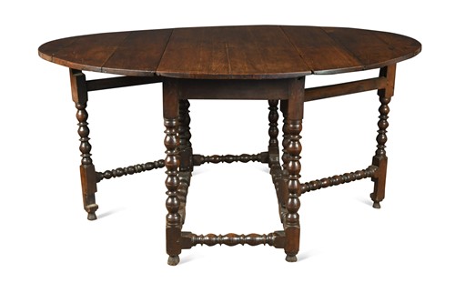 Lot 398 - A William & Mary oak gateleg table
