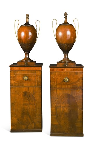Lot 571 - A pair of George III mahogany dining room urns and pedestals