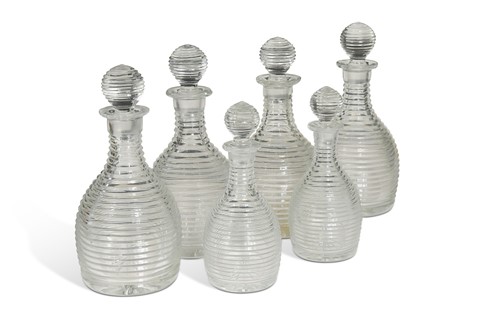 Lot 700 - A set of four cut glass decanters and stoppers, late 19th century