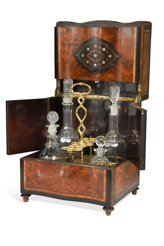 Lot 713 - An amboyna and ebonised decanter box, 19th century