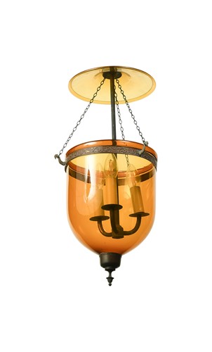 Lot 504 - A pair of amber coloured glass storm lanterns, 20th century