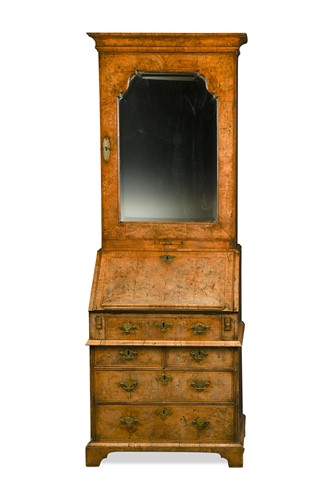 Lot 377 - A George I walnut bureau bookcase