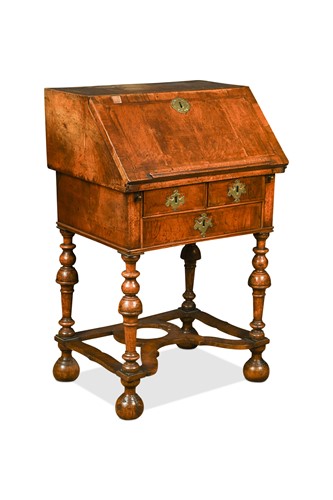Lot 347 - A small Queen Anne walnut bureau
