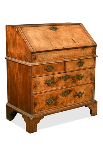Lot 393 - A walnut slope front bureau, early 18th century