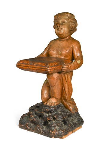Lot 373 - A carved lime wood putti, probably 19th century