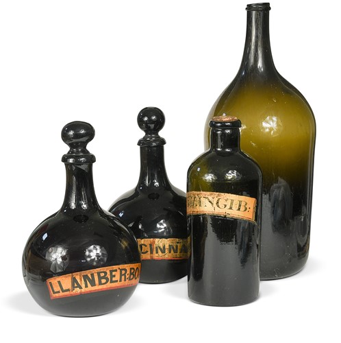Lot 342 - Four green glass apothecary bottles, 19th century