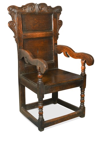 Lot 303 - An oak panel back open armchair, late 17th century and later