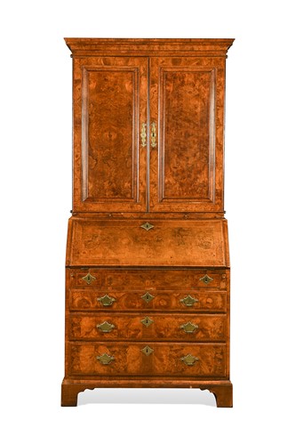 Lot 397 - A George I burr walnut bureau bookcase