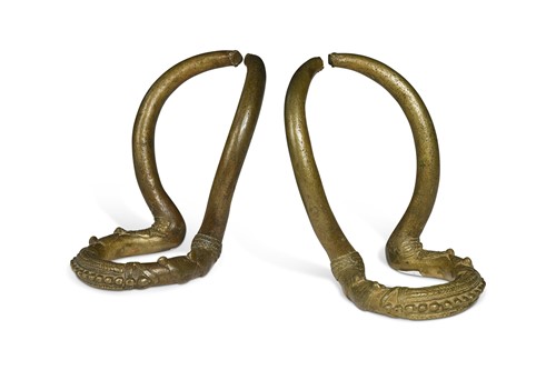 Lot 518 - An unusually large pair of West African brass anklets, 19th or 20th century