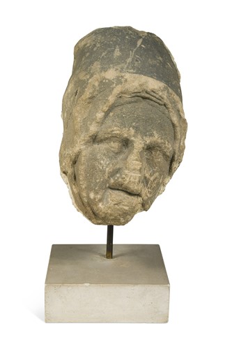 Lot 362 - A Medieval carved stone head
