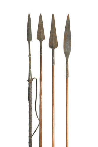 Lot 513 - A group of four African tribal spears and three various bows