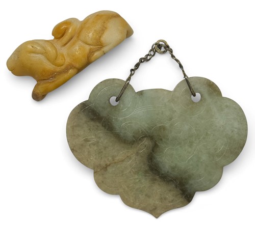 Lot 44 - A Chinese mottled green jade ruyi pendant, late Qing Dynasty