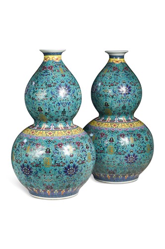 Lot 31 - A pair of Chinese turquoise ground double gourd vases